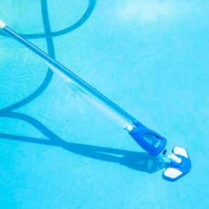 [freepicdownloader.com]-cleaning-swimming-pool-by-vacuum-cleaner-normal